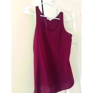 A dark maroon tank top